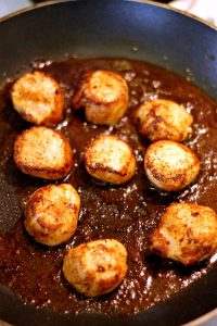 Spicy Pan Seared Scallops over a Red Cabbage Citrus Slaw