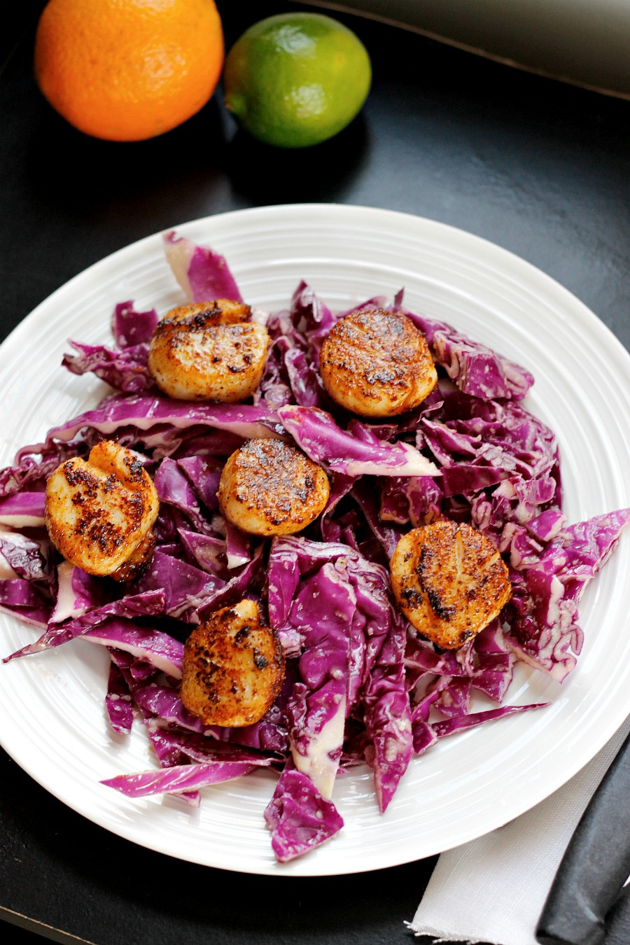 Spicy Pan Seared Scallops over a Red Cabbage Citrus Slaw