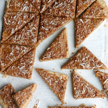 Biscoff Sugar Cookie Bars with Mascarpone Frosting and Toasted Coconut | Fabtastic Eats