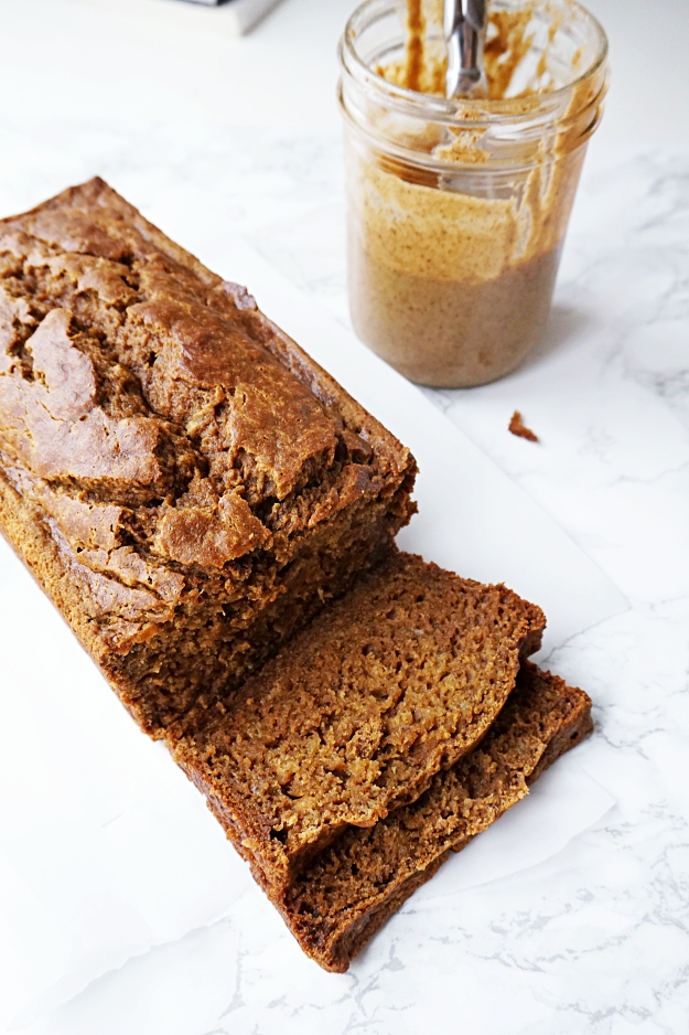 Perfectly spiced, warm and cozy Whole Wheat Pumpkin Banana Bread, perfect for an afternoon snack smeared with nut butter or warmed in the morning with your coffee, you'll just love this healthy treat!