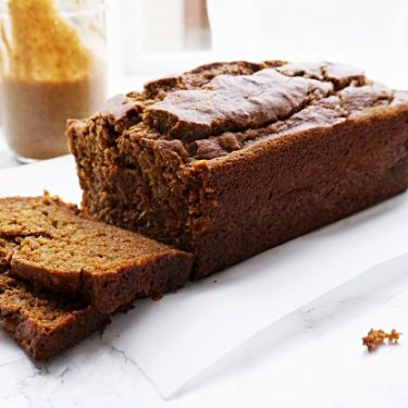 Perfectly spiced, warm and cozy Whole Wheat Pumpkin Banana Bread, perfect for an afternoon snack smeared with nut butter or warmed in the morning with your coffee, you'll just love this healthy treat!