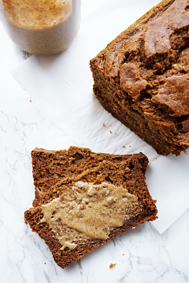 Perfectly spiced, warm and cozy Whole Wheat Pumpkin Banana Bread, perfect for an afternoon snack smeared with nut butter or warmed in the morning with your coffee, you'll just love this healthy treat!